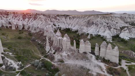 breathtaking aerial view of cappadocia's unique rock formations at sunset
