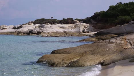 the famous kavourotripes beach in sithonia, chalkidiki, greece