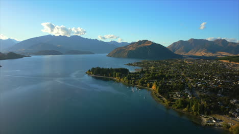 lake wānaka and the town of wanaka in the otago region of south island, new zealand - aerial parallax
