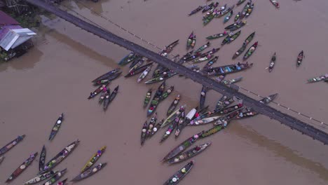 boats from floating food market on sungai martapura river in indonesia