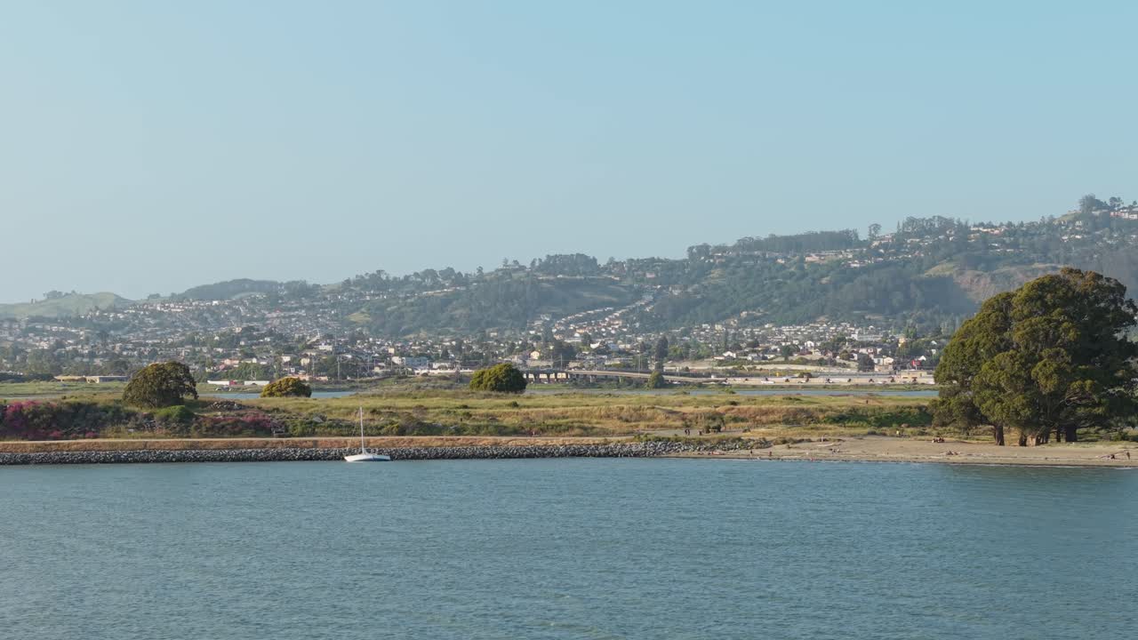 A right to left aerial panning shot the shoreline in Albany, California. Shot in 4K.