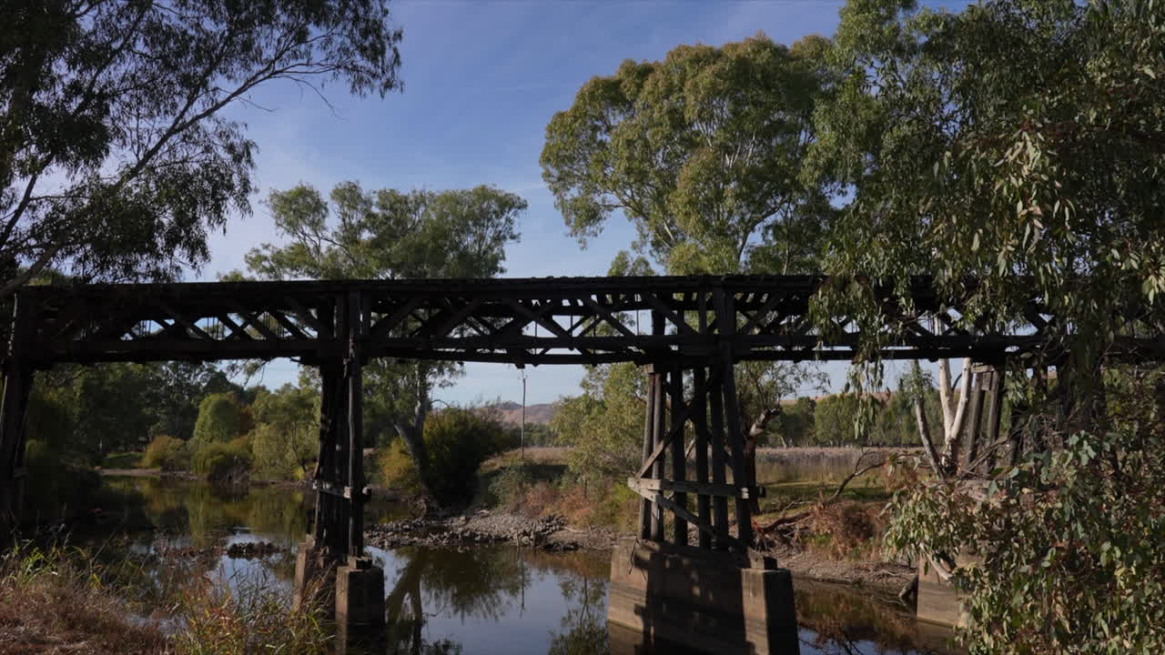 Mid wide shot of historic Prince Alfred bridge viaduct over the river in Gundagai , New South Wales, Australia