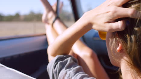 woman relaxing on a road trip