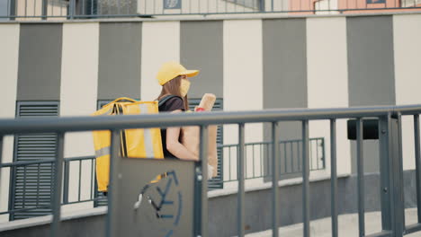 woman food delivery worker walking