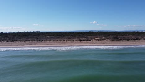 4K Low-Altitude Drone Shot Over Breaking Waves and Dunes with Vegetation in Albufera Natural Park, Valencia, Spain