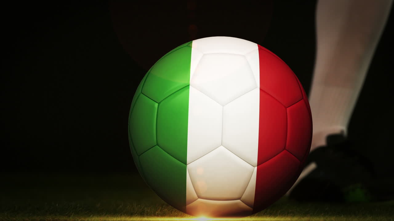Football player kicking italy flag ball