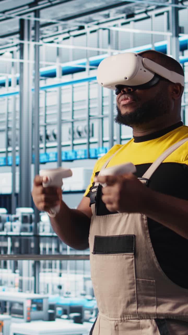 Vertical video Smart factory engineer using VR headset to oversee operation of robotic arms