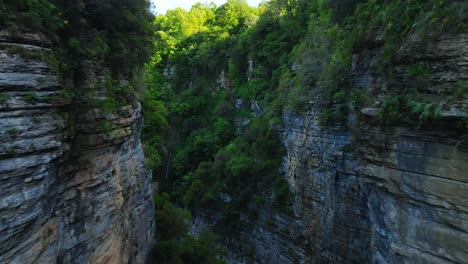 Aerial-zoom-in-shot-of-a-metal-bridge-in-the-Osum-canyon-in-Albania