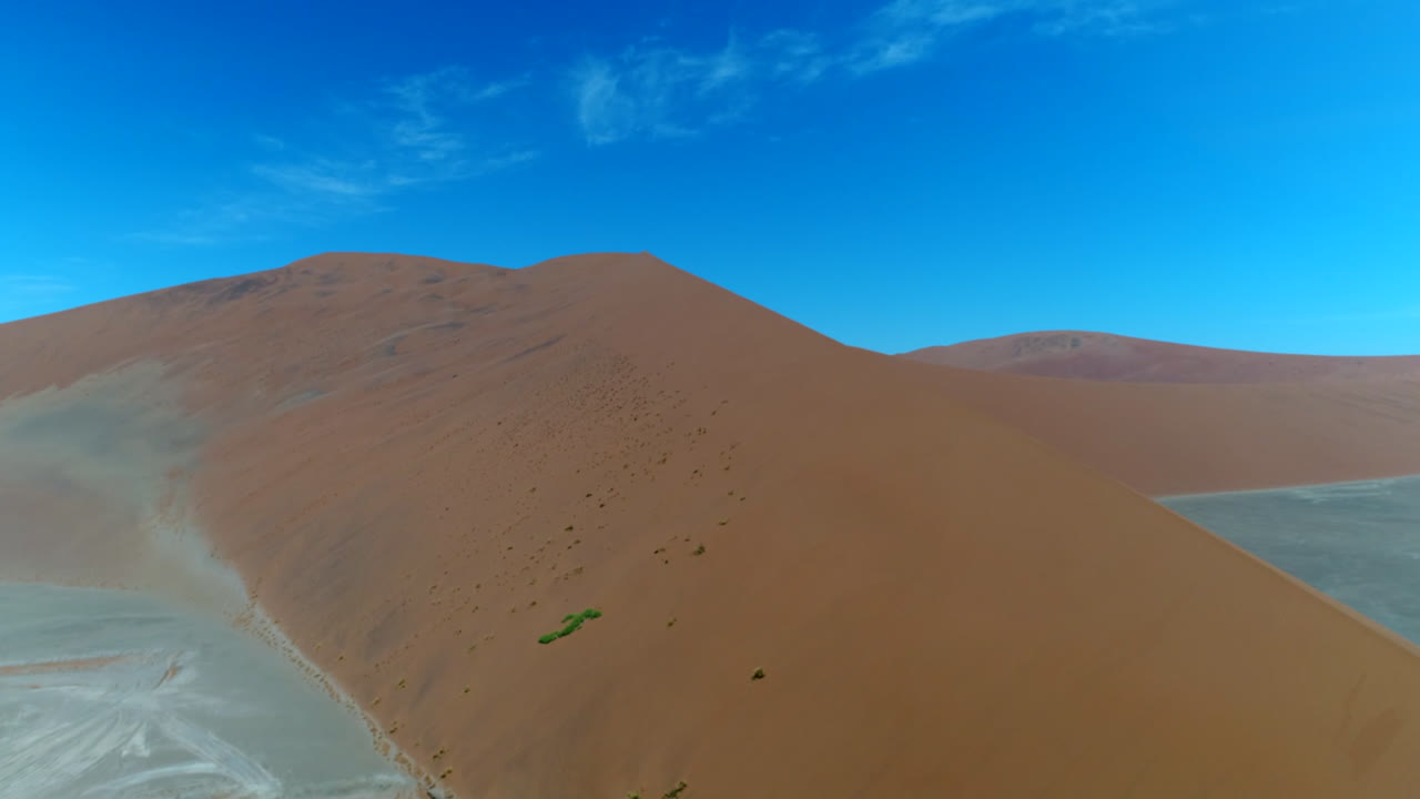 Aerial of Dune 45 surrounded by giant dunes near Sesriem Sossusvlei national park In Namibia.