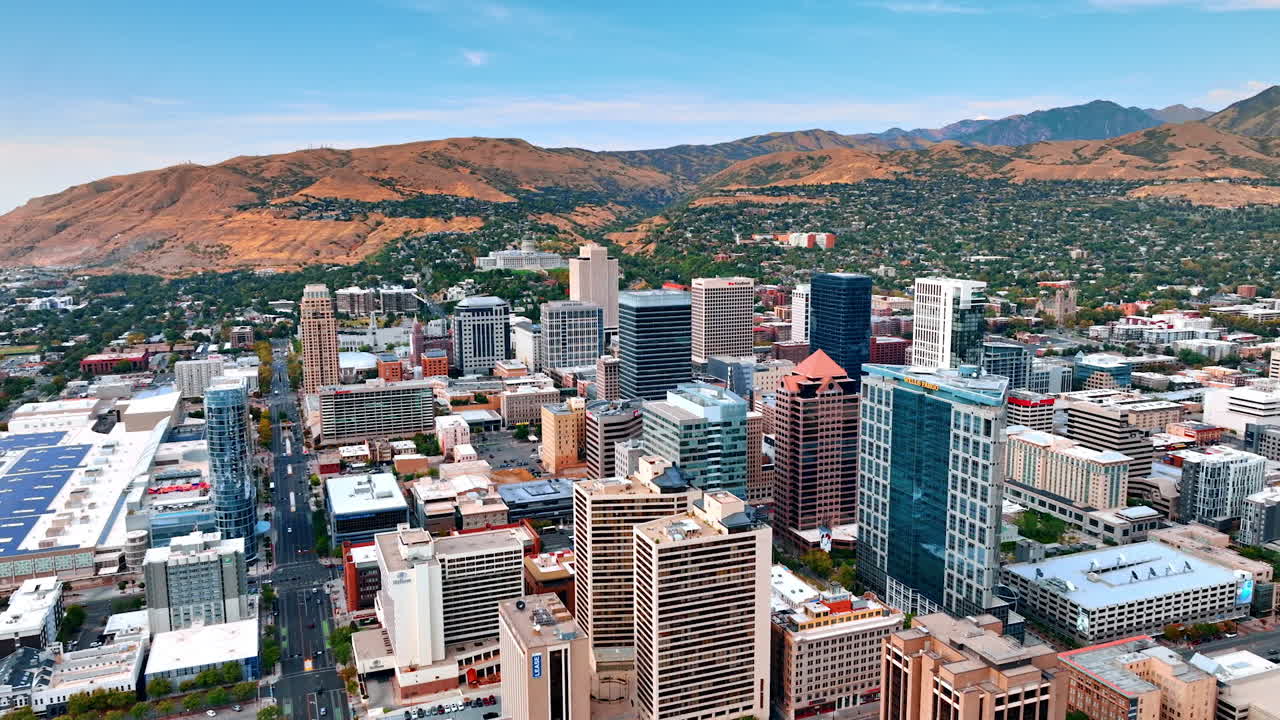 Salt Lake City USA, 1 August 2025: Salt Lake City downtown skyscrapers with mountain backdrop. City skyline of Salt Lake City, Utah, with high-rise buildings and scenic mountain view