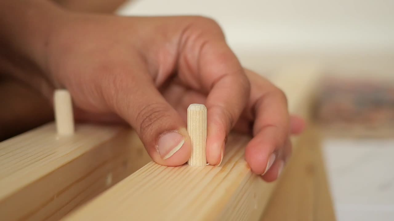 Assembling furniture with wooden dowels