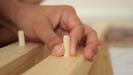 Assembling furniture with wooden dowels