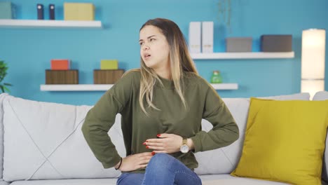 young girl with stomachache.