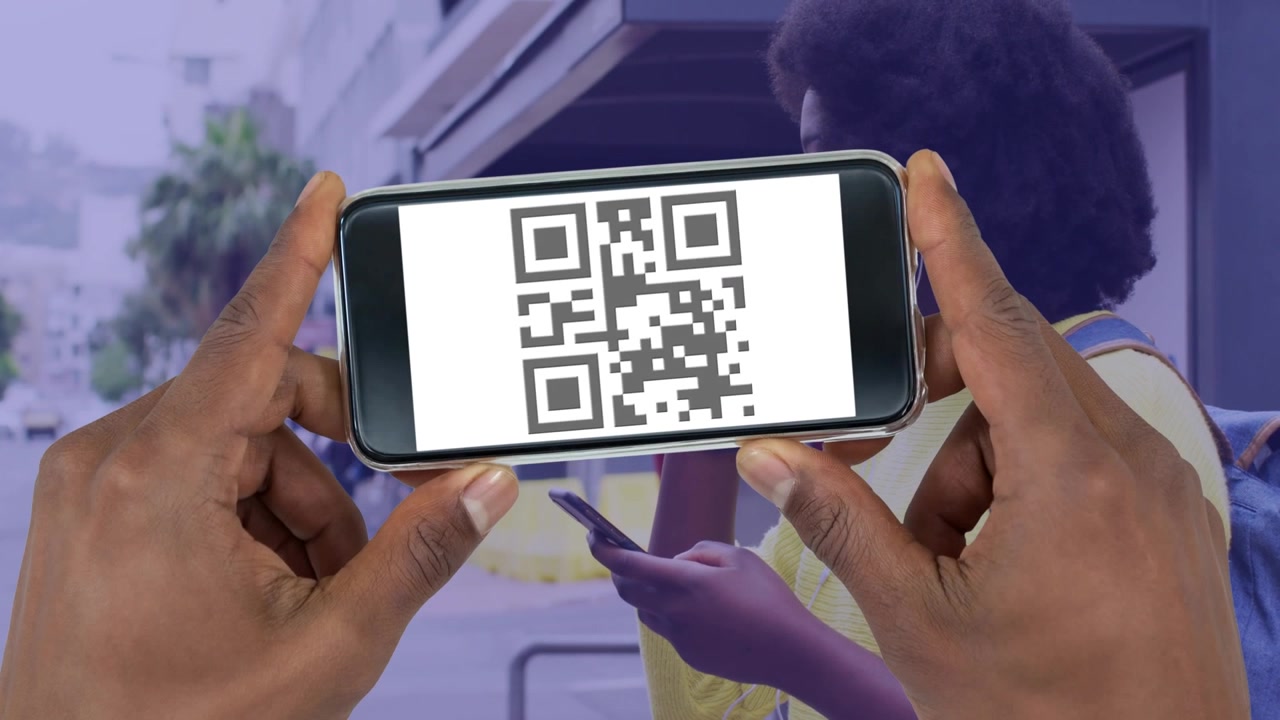 Animation of hands with smartphone over african american businesswoman using smartphone