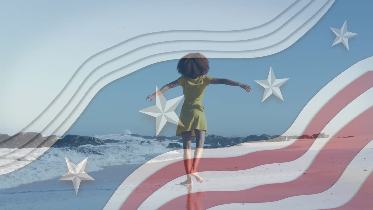 해가 지는 동안 해변에서 춤을 추는 여성 위에 미국 발 애니메이션을 흔들고 있습니다.