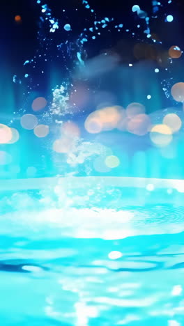 a blue circle with water flowing out of it. the water is illuminated and the circle is surrounded by rocks