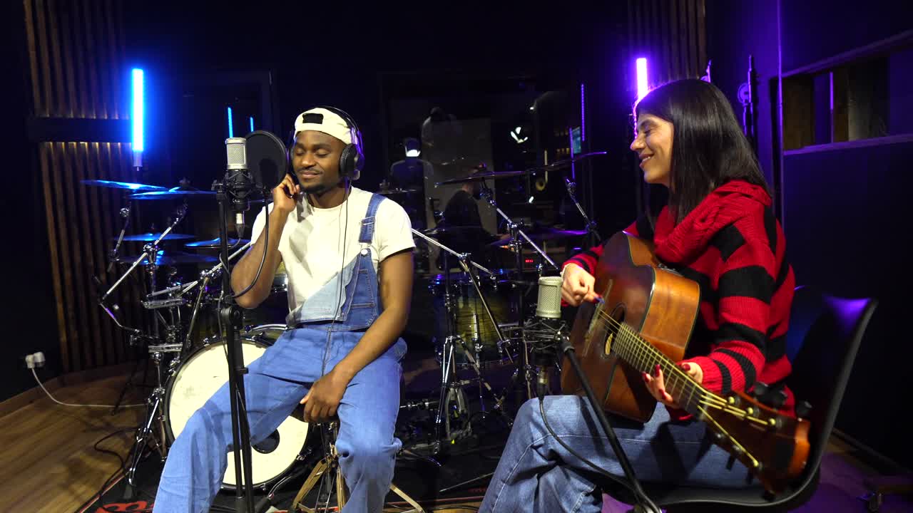 Musicians Performing in Recording Studio