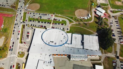 View-From-Above-Of-Alberni-District-Secondary-School-And-Turf-Field-On-Vancouver-Island,-BC,-Canada