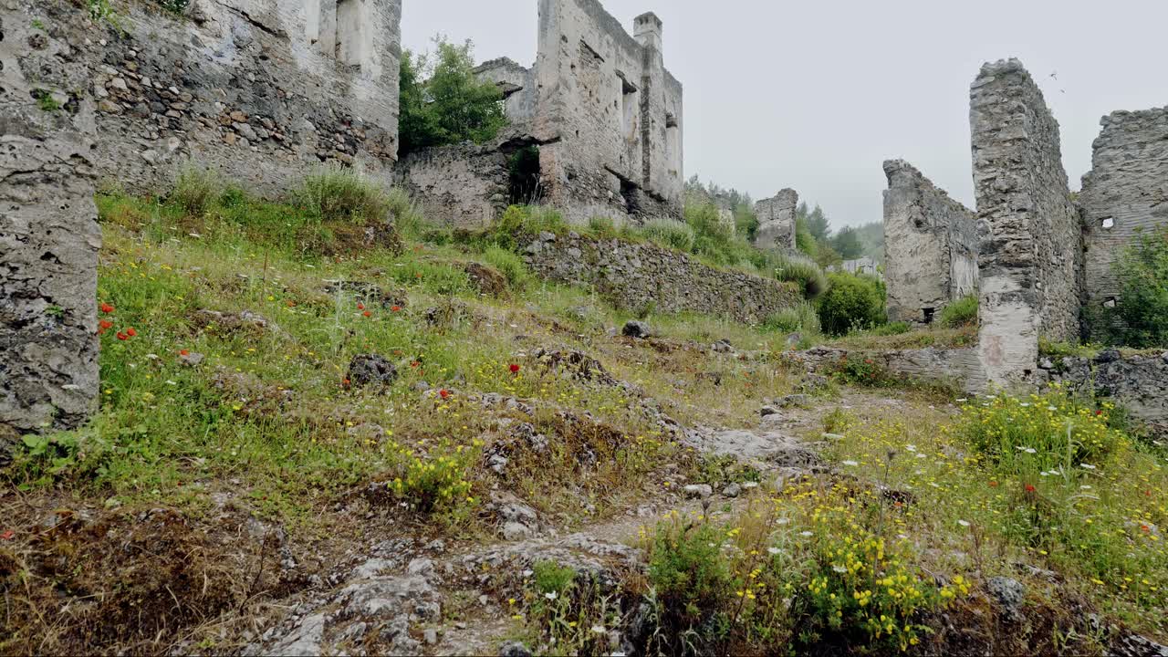Ruins of old roofless abandoned Greek village of Kayakoy Turkey ghost town