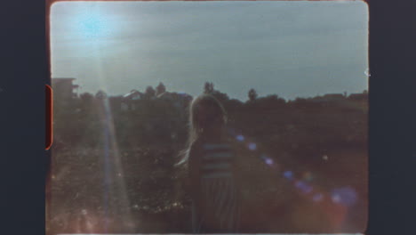 vintage film clip of a smiling young girl