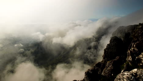 curious cloud movement at top of ancient table mountain, cape town