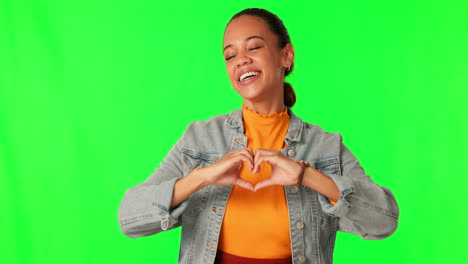 Hands,-heart-shape-and-woman-portrait-on-green