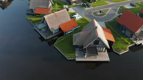 Aerial-View-Of-Holiday-Villas-On-The-Water,-Waterstaete-Ossenzijl,-The-Netherlands---drone-shot