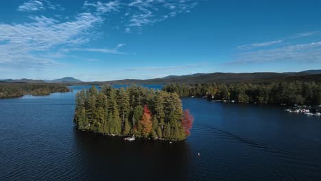 islet with pine trees by the lake during autumn