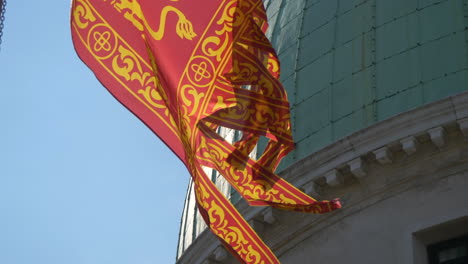 Venice-flag-fluttering-with-a-sunny-day,-Venice,-Italy