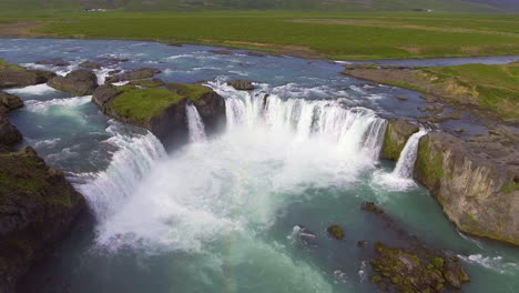 drone aerial footage of the godafoss waterfall in north iceland.