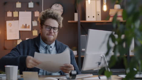 Stressed Businessman Throwing Papers