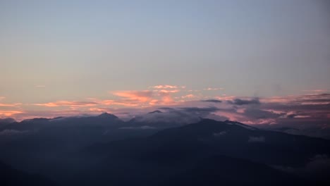 Golden-sun-light-permeating-behind-mountain-range