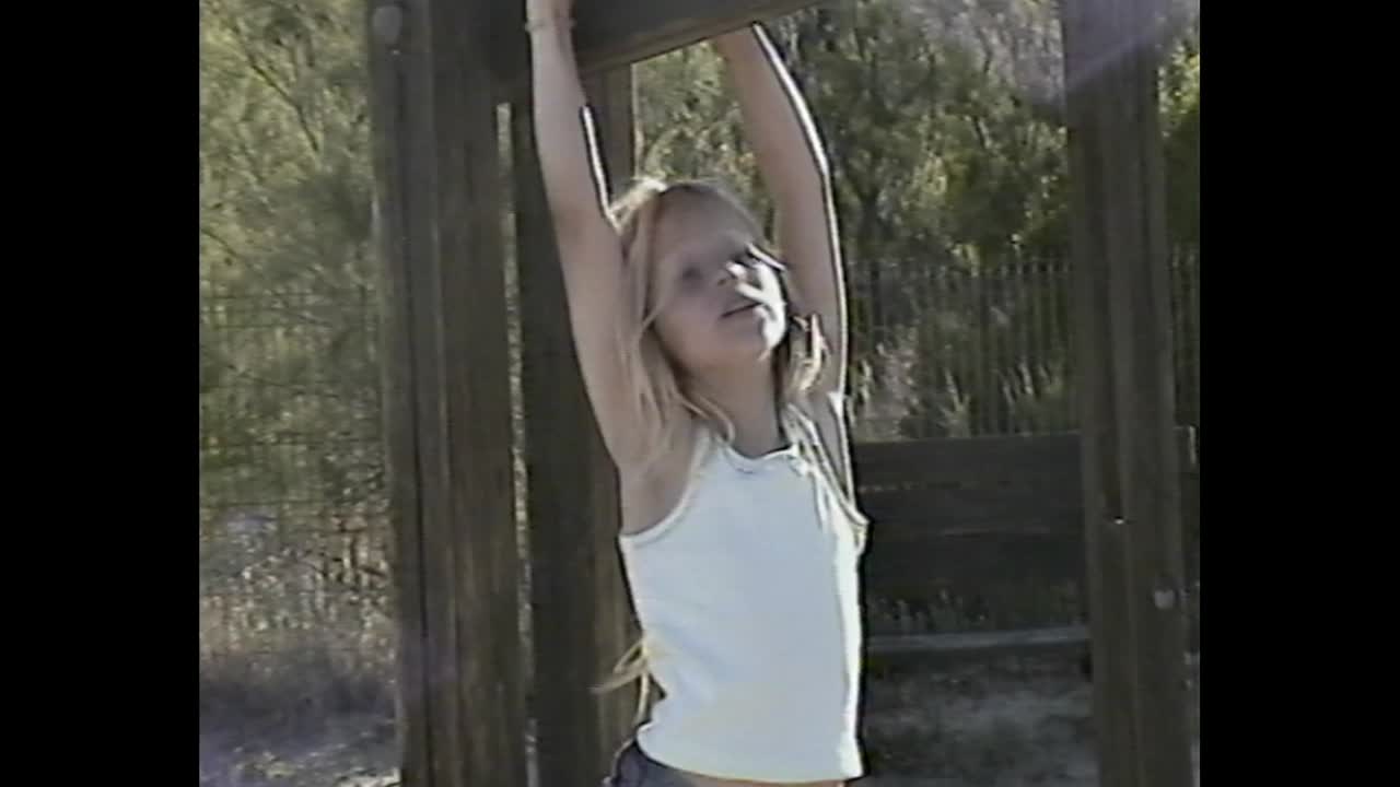 Child playing on playground equipment