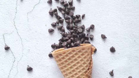 chocolate ice cream cone with sprinkled chocolate chips