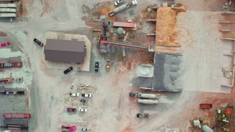 aerial drone's forward view over ready mix concrete supplier