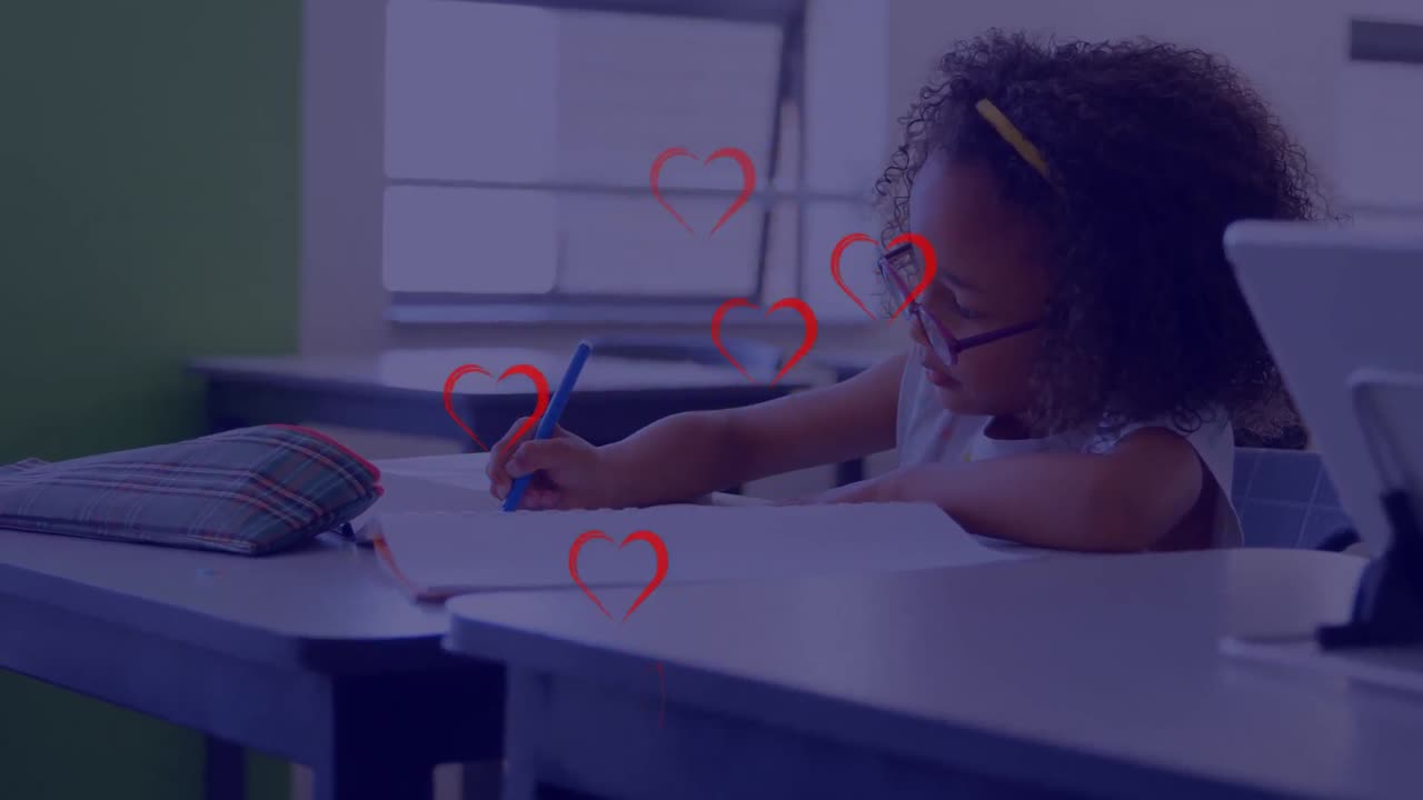 Animation of red hearts over african american schoolgirl in classroom