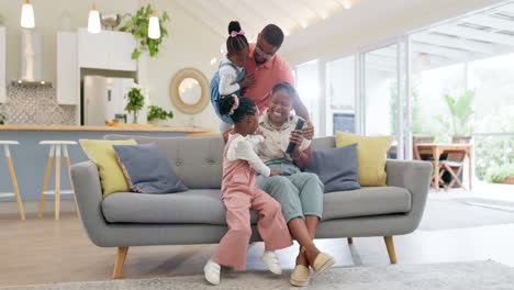 Happiness,-playful-parents-and-kids-on-sofa