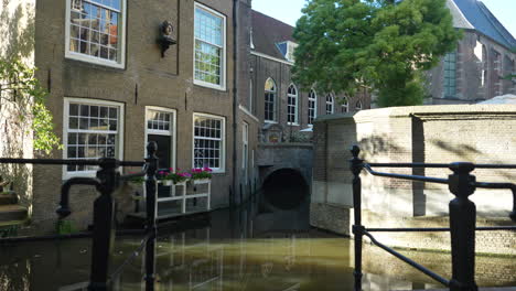 view of canal and museumcafe in gouda, netherlands - tilt up