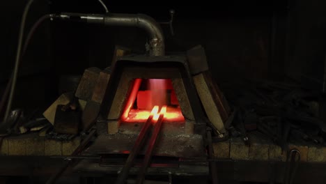 metal being heated in a forge