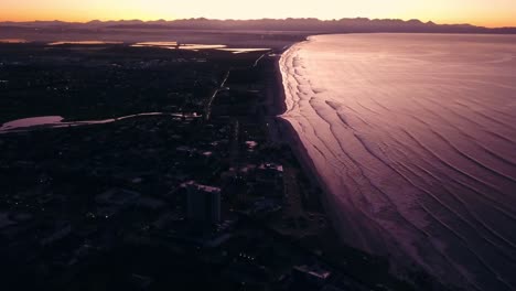 drone flight over muizenberg and sandvlei in the morning sunrise