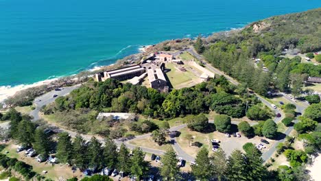 Drone-aerial-landscape-view-Trial-Bay-Gaol-prison-buildings-historic-travel-tourism-holiday-South-West-Rocks-Kempsey-NSW-Australia-4K