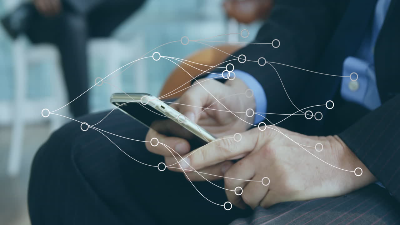 Animation of network of connections caucasian businessman using smartphone