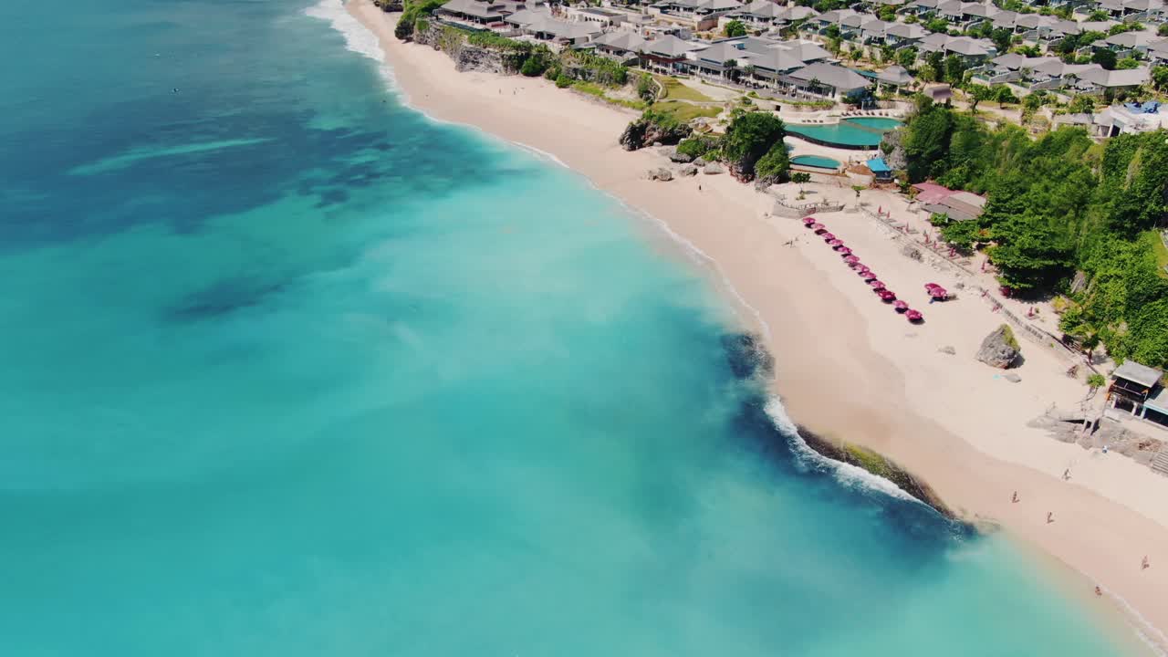 Dreamland Beach Bali from above, aerial 4k footage. Azure water and punch colors, white sand beach.