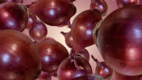 red onions falling down. slow motion.