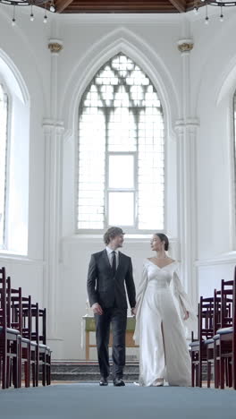 couple walking down the aisle at a wedding ceremony