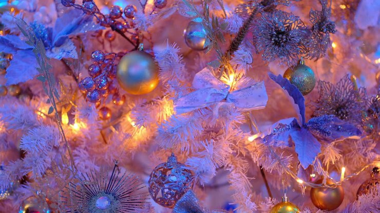 Christmas tree with flashing colorful lights and golden ornaments