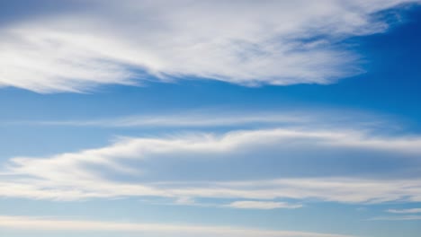 blue sky with wispy clouds