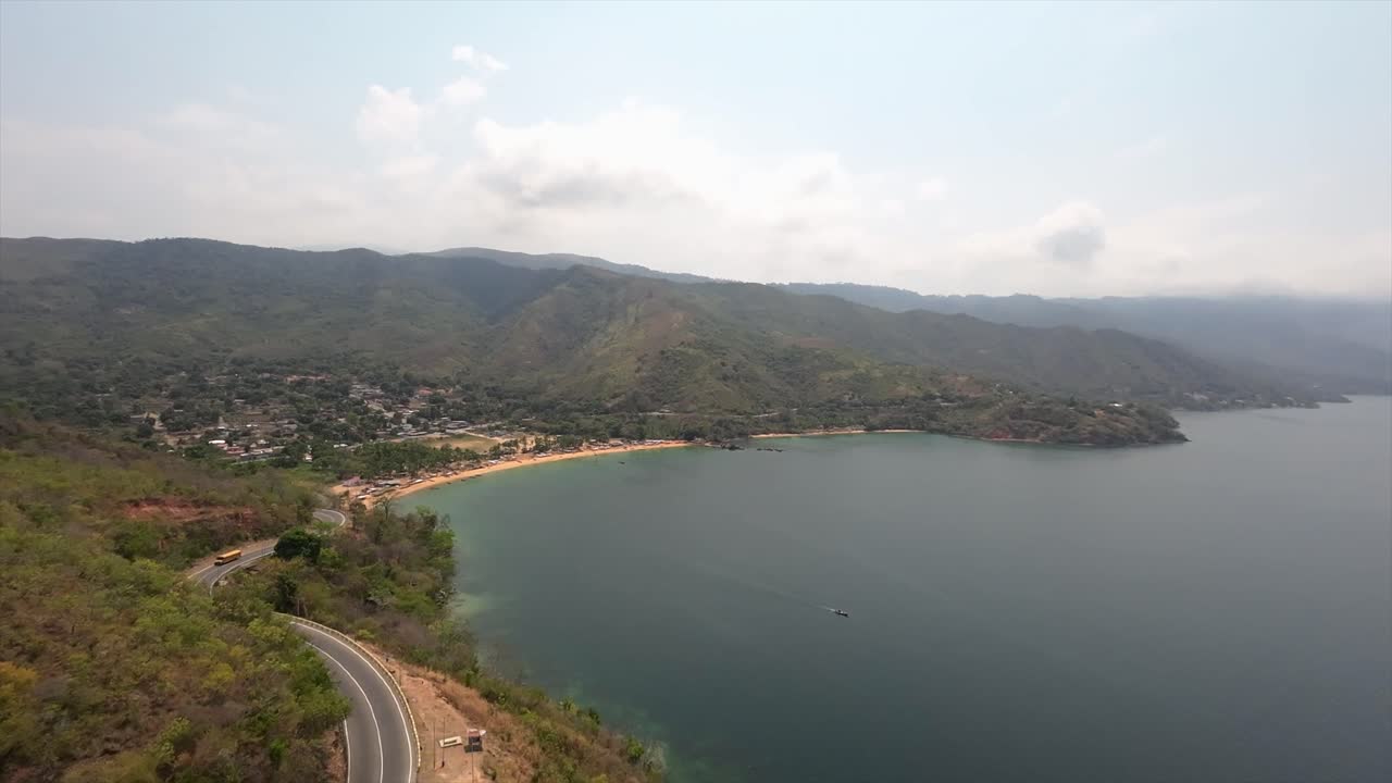 Drone view of Colorada Beach and palm trees in calm Caribbean setting