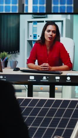 vertical video photovoltaics plant engineers design solar cell prototypes in videocall meeting