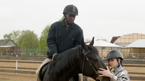 man getting ready to ride a horse 1